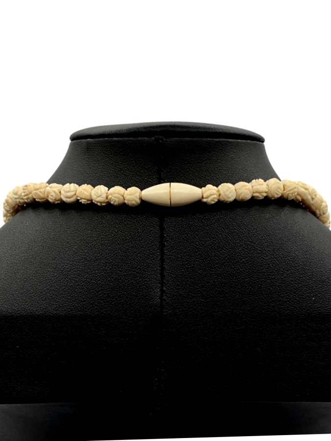 Hand-carved necklace