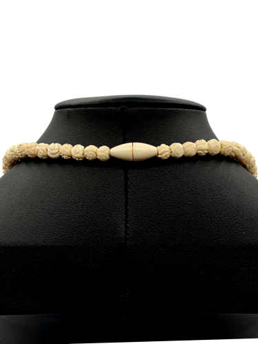 Hand-carved necklace