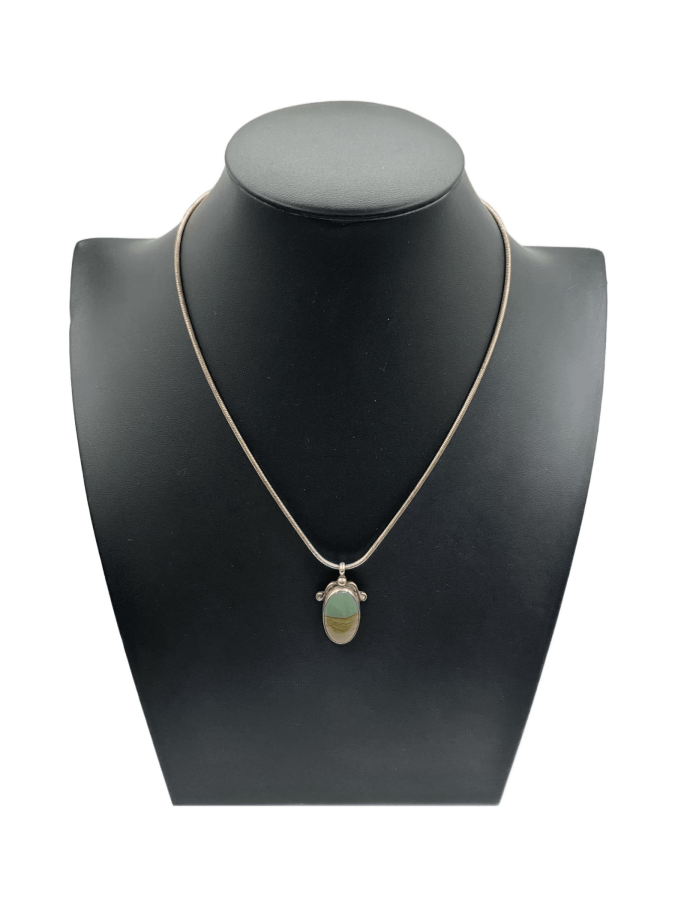 Oval asymmetrical pendant