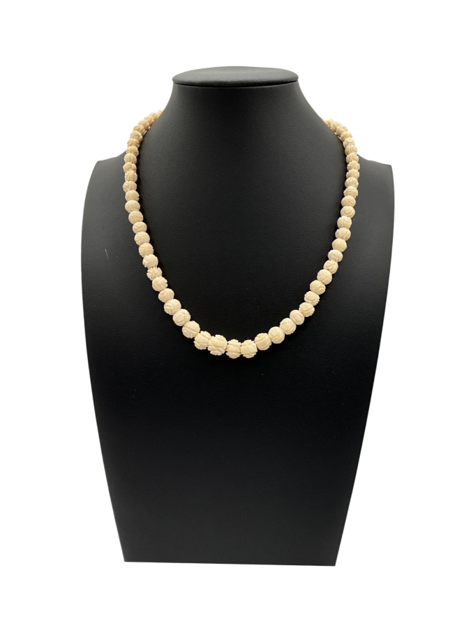 Hand-carved necklace