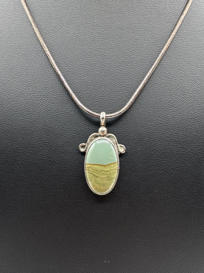 Oval asymmetrical pendant