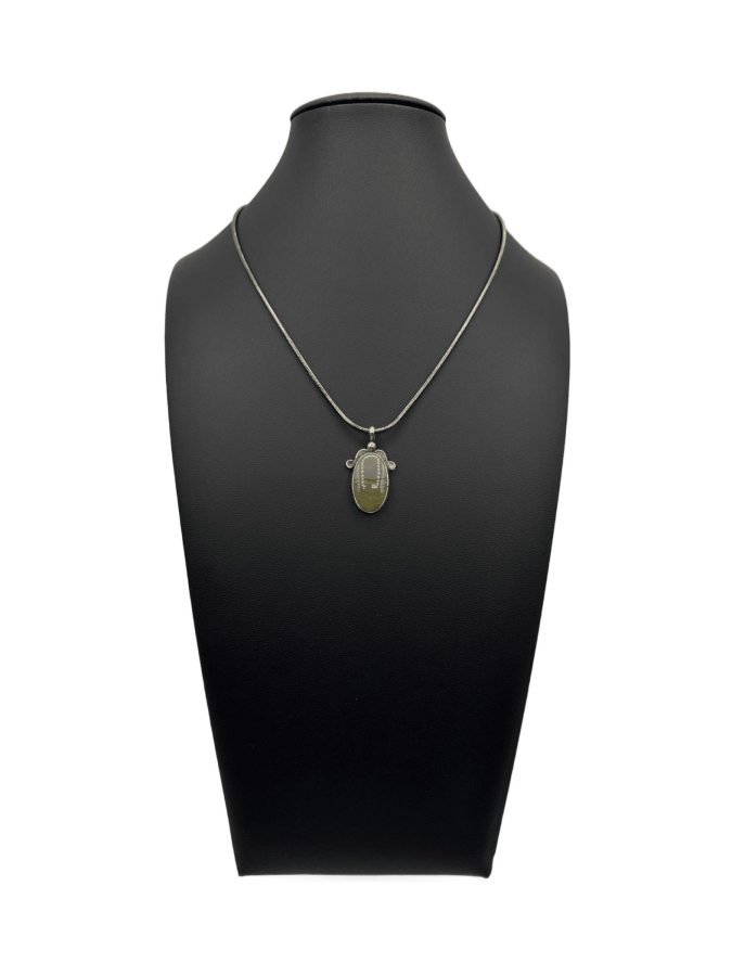 Oval asymmetrical pendant