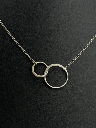 Entwined rings necklace