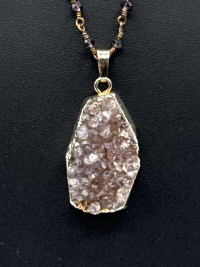 Stunning purple stone pendant