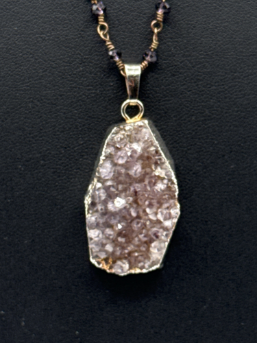 Stunning purple stone pendant