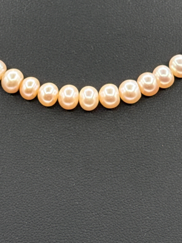 Peach pearl necklace