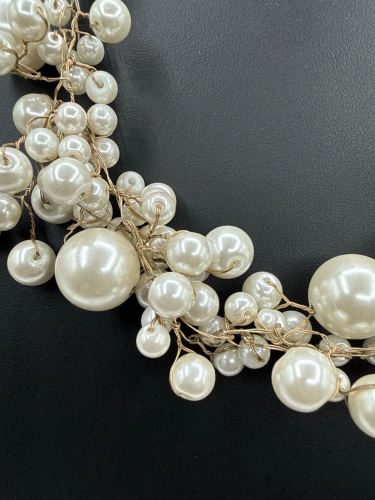 Cascade of faux pearls necklace