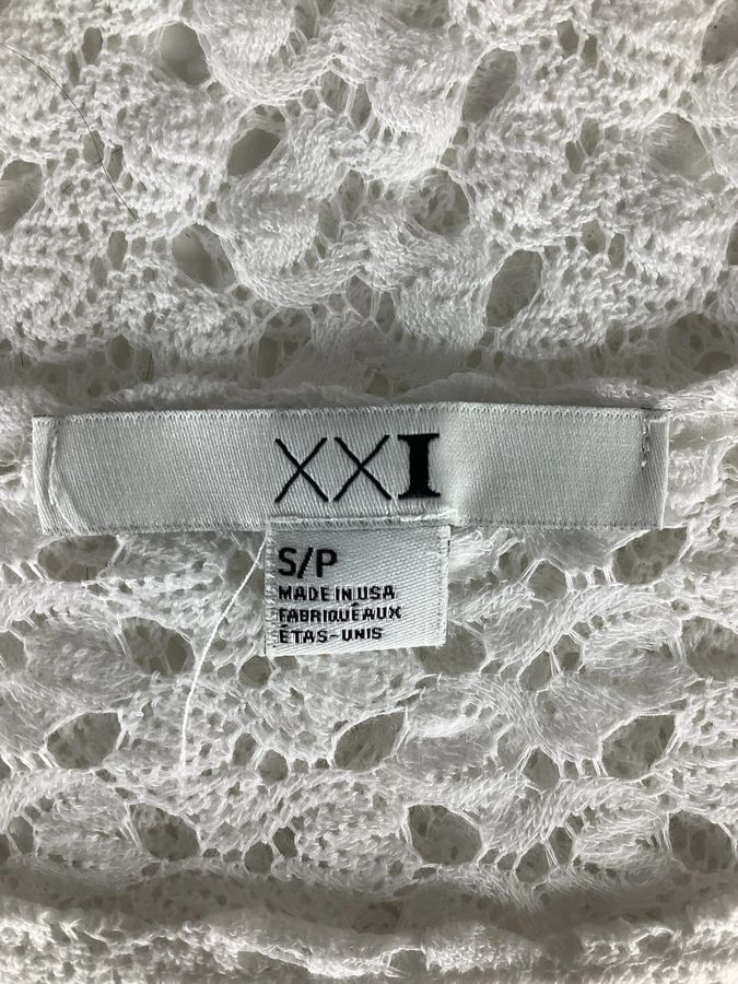 XXI