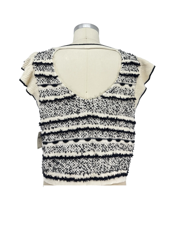 By Anthropologie