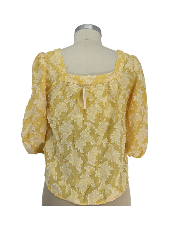 By Anthropologie